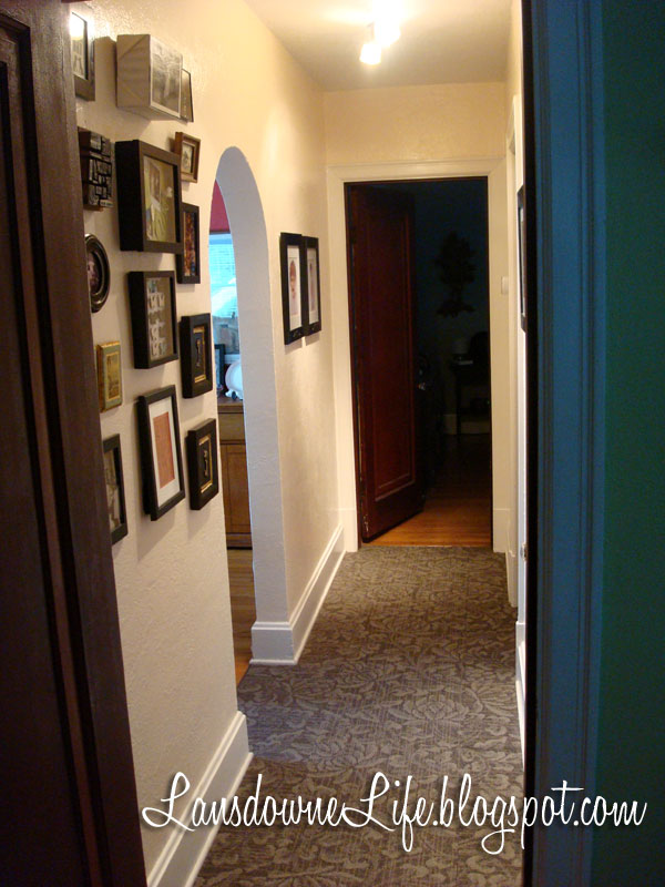 Hallway makeover with new carpet, paint, and artwork