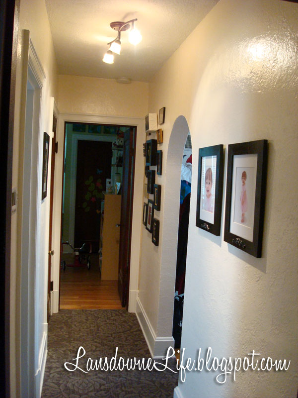 Hallway makeover with new carpet, paint, and artwork