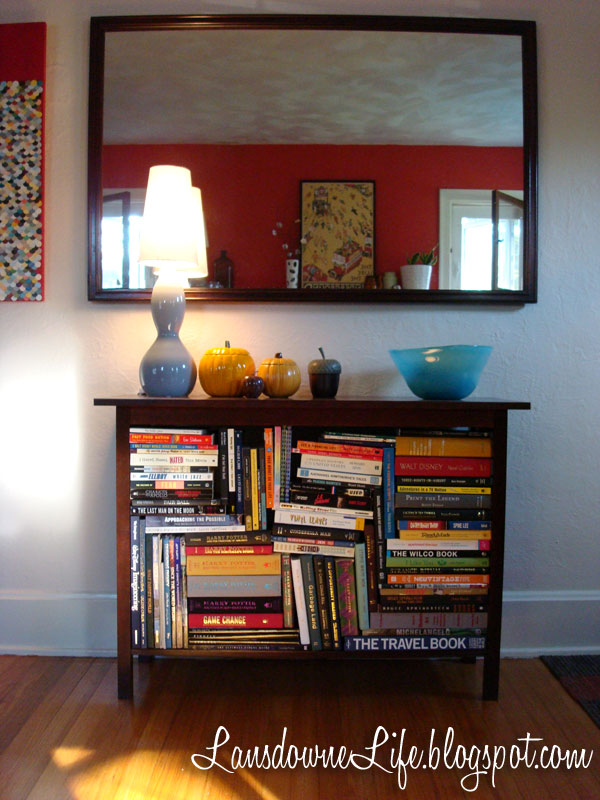 Using an open console table for book storage