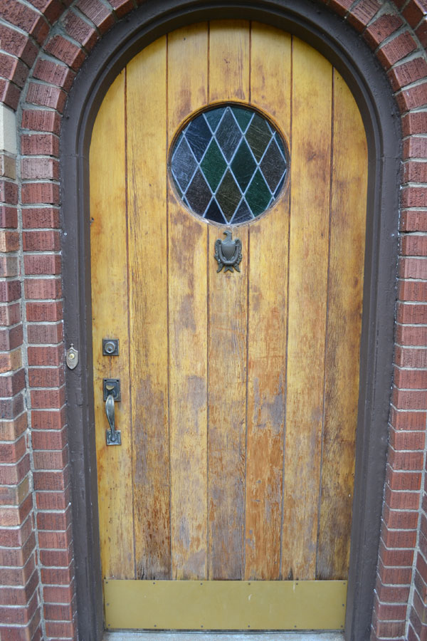 Refinishing a flaky and peeling wood front door