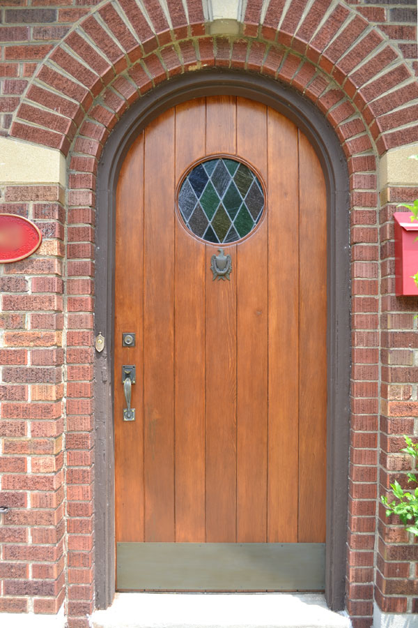 Faux painted brass patina on door kickplate