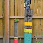 Homemade backyard sculpture: Painted posts