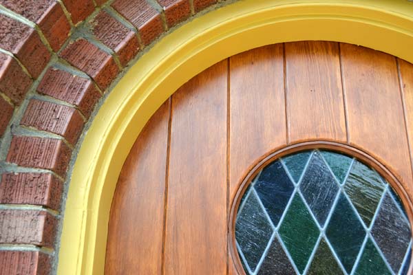 Stripping and refinishing our wood door frame