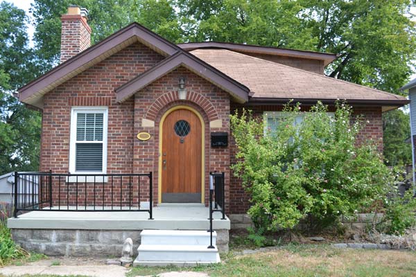 Curb appeal improvements on a Tudor cottage house