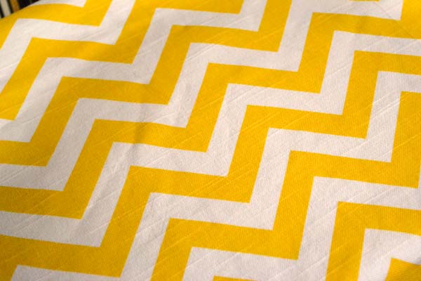 Yellow chevron fabric remnant