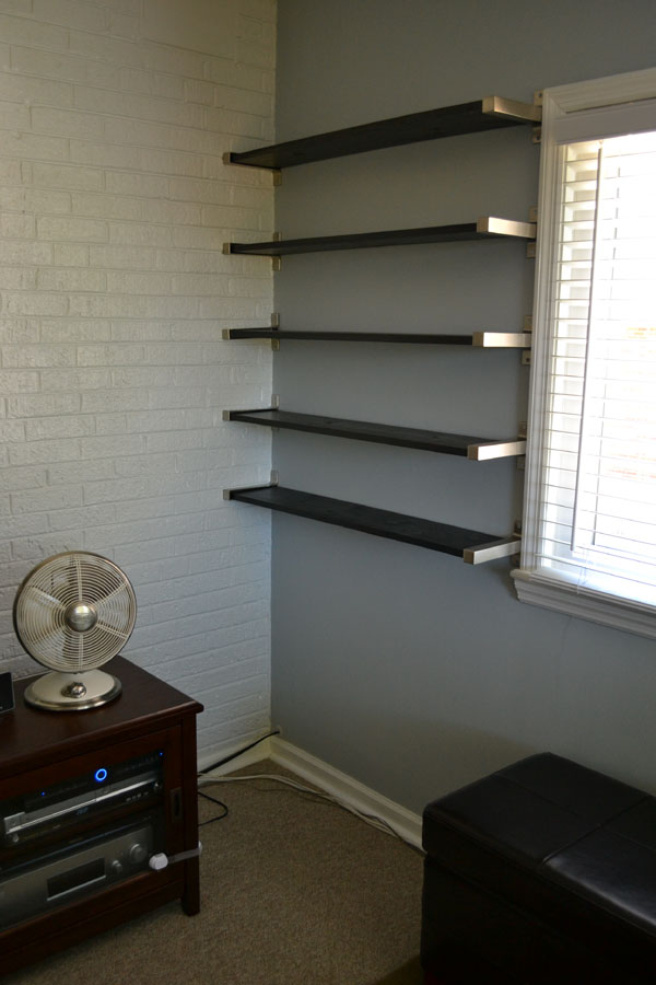 Installing custom wall shelves for DVD storage