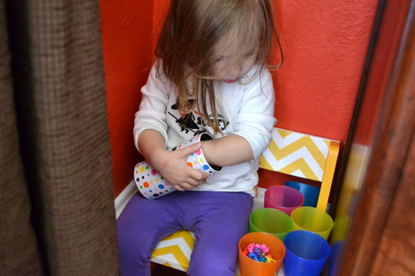 Playing with cups and beads