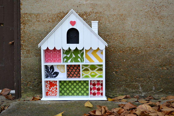 House shelf turned toddler dollhouse