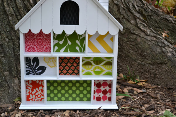 House shelf turned toddler dollhouse