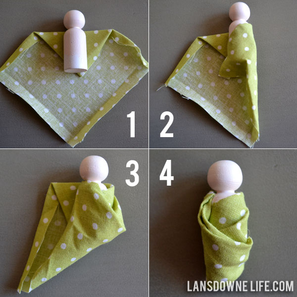 Baby Shower: Swaddled peg doll babies