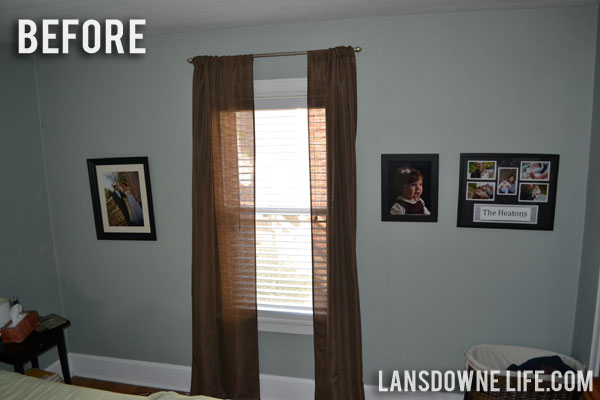 Bedroom family photo gallery wall