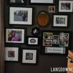 Bedroom family photo gallery wall