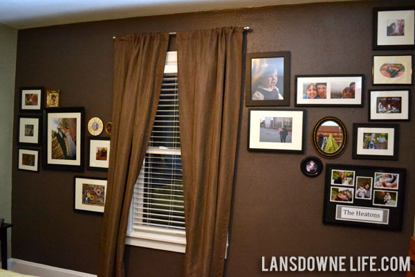 Bedroom family photo gallery wall