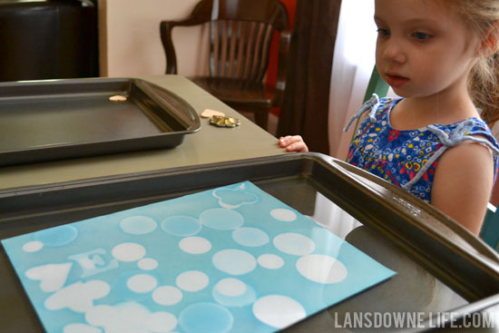 Submerging the exposed sunprints in water