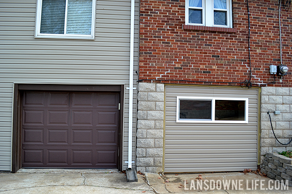 Replacing an old garage door with a wall