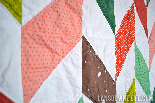 Herringbone half-square triangle baby quilt