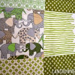 Green patchwork squares baby quilt