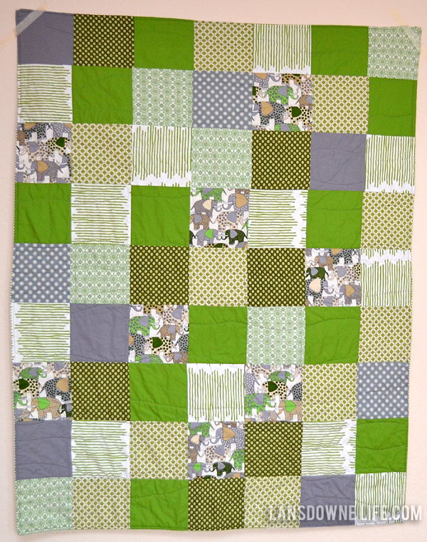 Green patchwork squares baby quilt