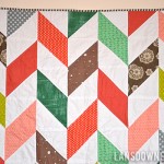 Herringbone half-square triangle baby quilt