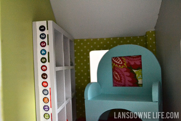 Dollhouse sitting room with bookshelf