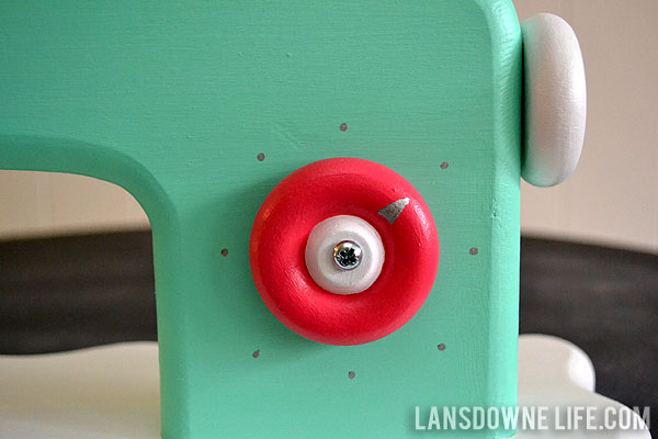 Playing with a Miniature Sewing Machine