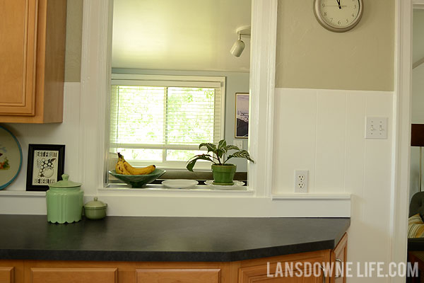 Painted wood molding kitchen backsplash