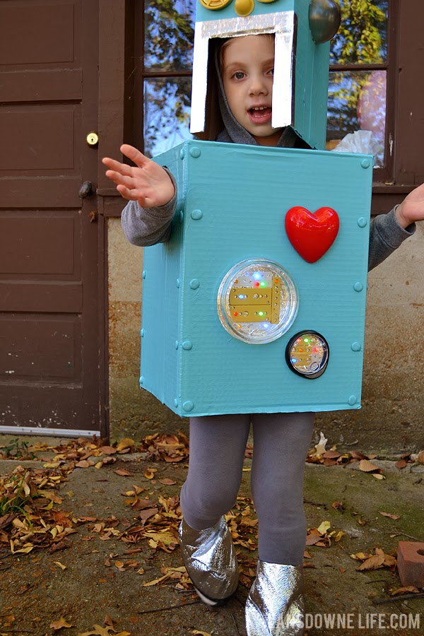 DIY robot costume made from cardboard boxes and junk