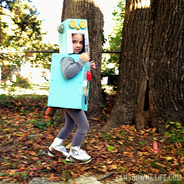 DIY robot costume made from cardboard boxes and junk