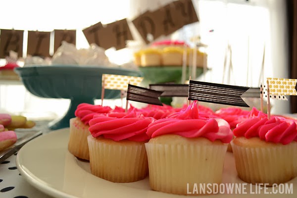 First birthday party featuring black and white polka dots and bright colors