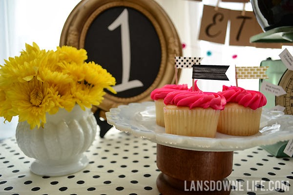 First birthday party featuring black and white polka dots and bright colors