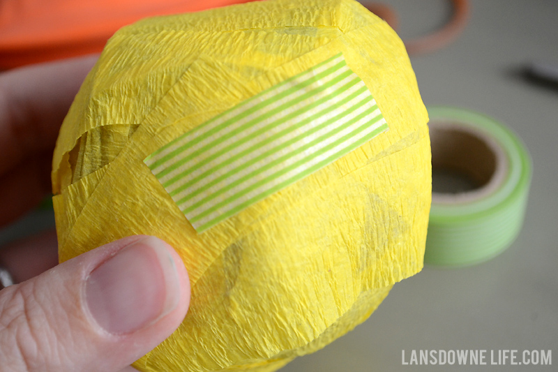 Wrap surprise ball with crepe paper and washi tape