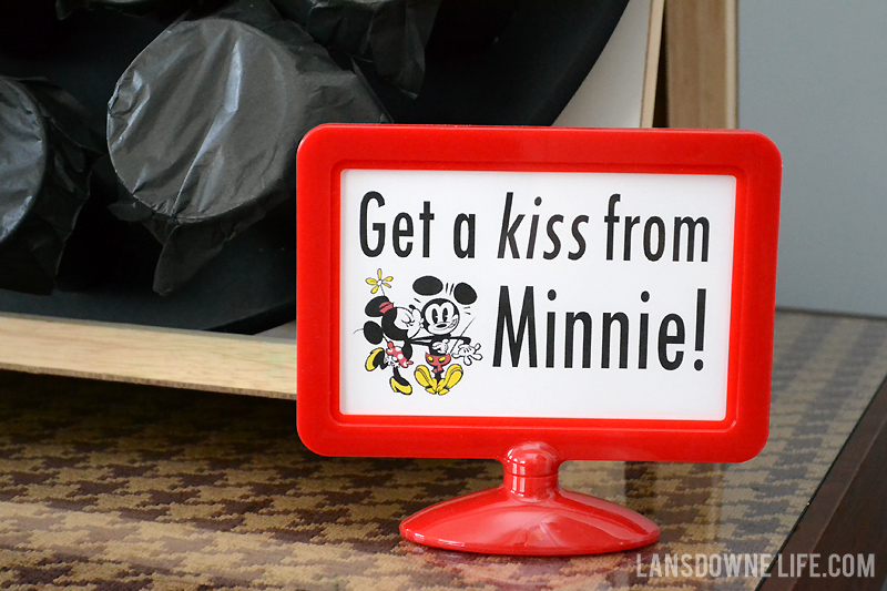 Get a kiss from Minnie sign